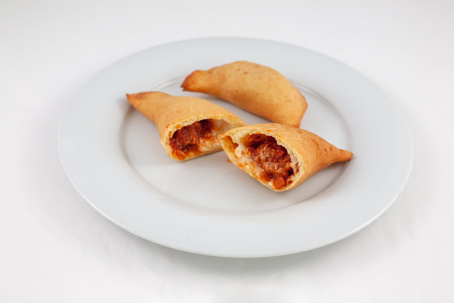 Panzerotto with meat sauce and meatballs