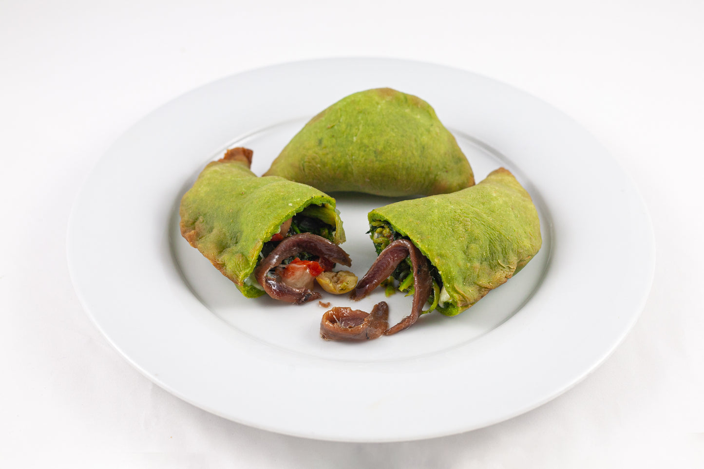 Panzerotto with Turnips, Anchovies, Stewed Turnips, Black Olives and Caciocavallo
