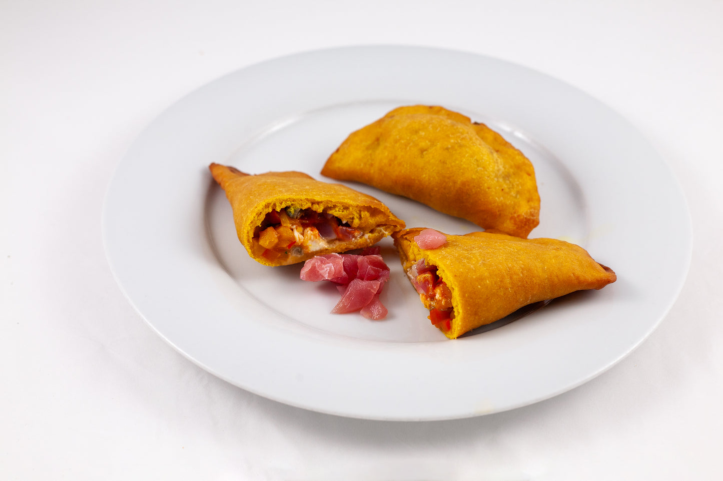 Turmeric Panzerotto with Tuna Tartare, Pepper Cream and Capers